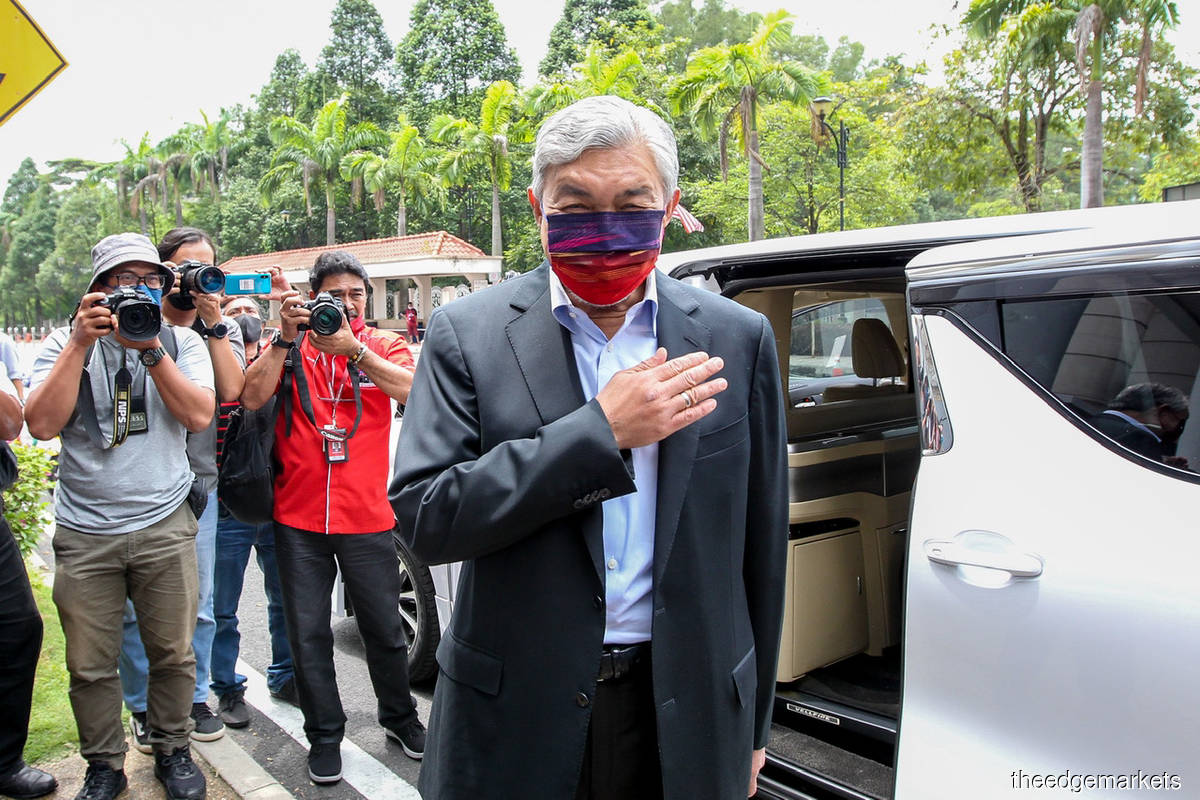 For the 26th money laundering charge, Ahmad Zahid is accused of having committed the offence by allegedly being engaged directly in a transaction involving proceeds from a lawful activity by giving instructions for the purchase of two property lots using a RM5.9 million cheque issued by law firm Messrs Lewis & Co. (Photo by Mohamad Shahril Basri/The Edge)
